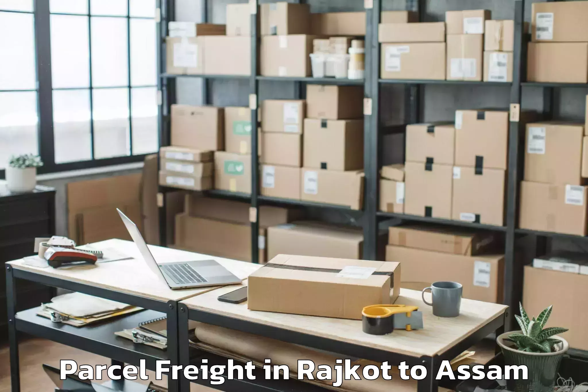 Affordable Rajkot to Moranhat Town Parcel Freight